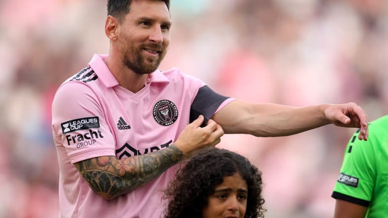 Jul 25, 2023; Fort Lauderdale, FL, USA; Inter Miami CF forward Lionel Messi (10) smiles as the teams stand for the national anthem before the game against the Atlanta United at DRV PNK Stadium. Mandatory Credit: Sam Navarro-USA TODAY Sports
