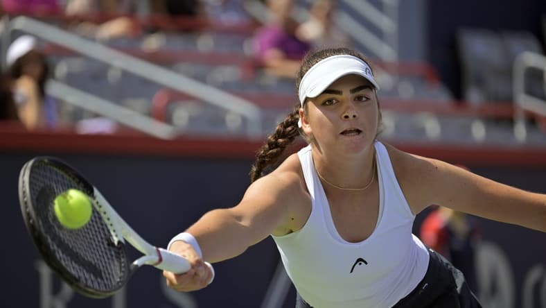 Aug 5, 2023; Montreal, Quebec, Canada; Marina Stakusic (CAN) hits a forehand against Alycia Parks (USA) (not pictured) in first round qualifying play at IGA Stadium. Mandatory Credit: Eric Bolte-USA TODAY Sports