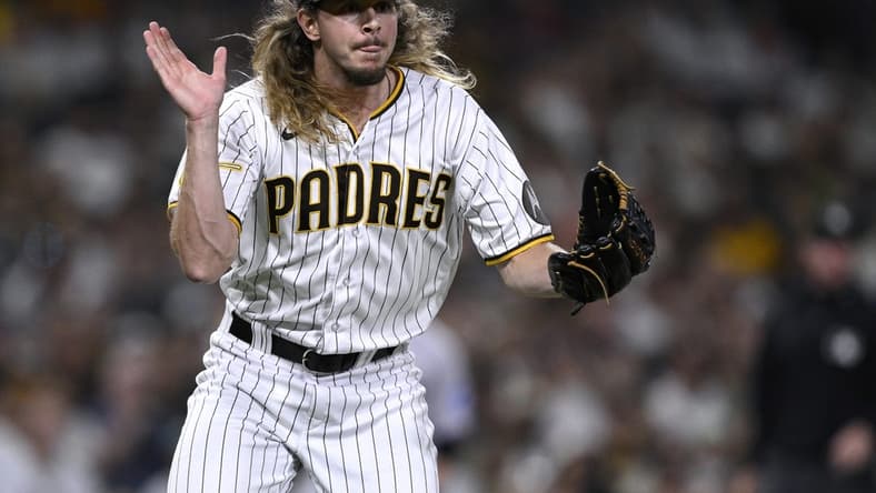Aug 22, 2023; San Diego, California, USA; San Diego Padres relief pitcher Scott Barlow (58) reacts during the seventh inning against the Miami Marlins at Petco Park. Mandatory Credit: Orlando Ramirez-USA TODAY Sports