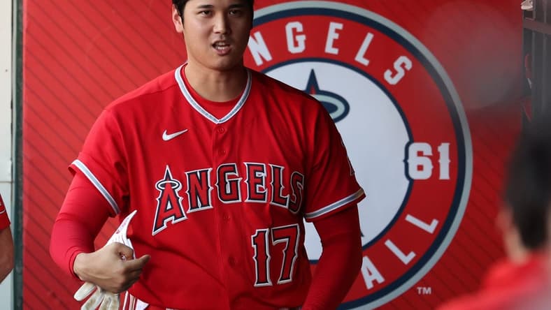 Aug 22, 2023; Anaheim, California, USA; Los Angeles Angels designated hitter Shohei Ohtani (17) in the dugout during the MLB game against the Cincinnati Reds at Angel Stadium. Mandatory Credit: Kiyoshi Mio-USA TODAY Sports
