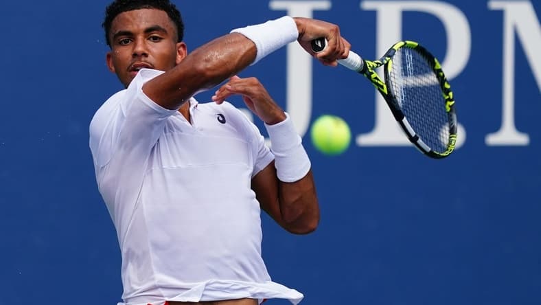 Aug 29, 2023; Flushing, NY, USA;  Arthur Fils of France hits a shot against Tallon Griekspoor of Netherlands on day two of the 2023 U.S. Open tennis tournament at the USTA Billie Jean King National Tennis Center. Mandatory Credit: Jerry Lai-USA TODAY Sports