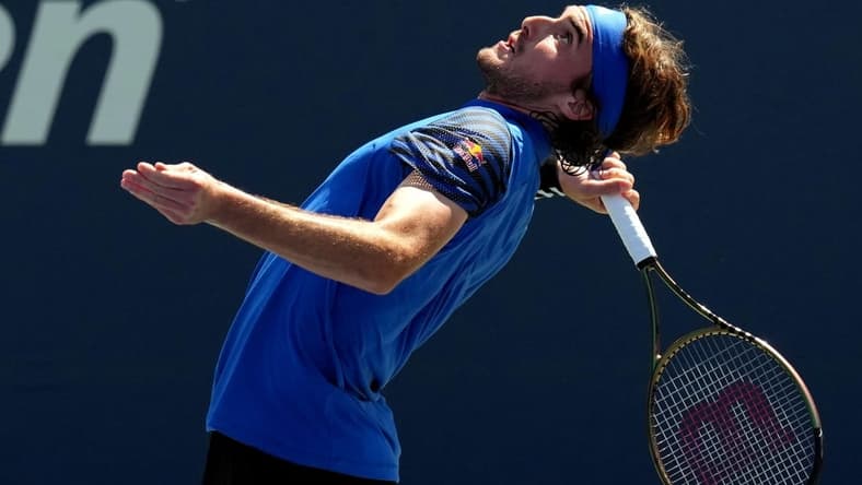 Aug 30, 2023; Flushing, NY, USA; Stefanos Tsitsipas of Greece serves to Dominic Stricker of Switzerland on day three of the 2023 U.S. Open tennis tournament at USTA Billie Jean King National Tennis Center. Mandatory Credit: Danielle Parhizkaran-USA TODAY Sports