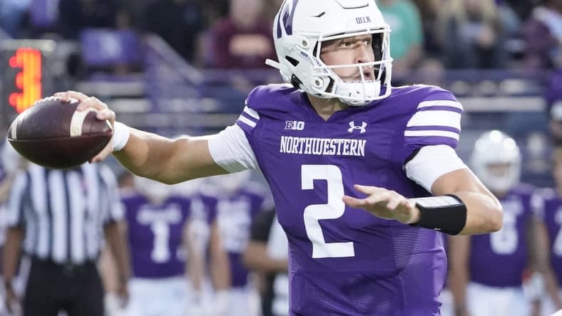 Sep 23, 2023; Evanston, Illinois, USA; Northwestern Wildcats quarterback Ben Bryant (2) looks to pass against the Minnesota Golden Gophers during the first quarter at Ryan Field. Mandatory Credit: David Banks-USA TODAY Sports