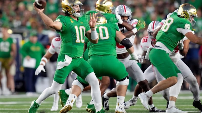 Sep 23, 2023; South Bend, Indiana, USA; Notre Dame Fighting Irish quarterback Sam Hartman (10) throws the ball against Ohio State Buckeyes during the first quarter of their game at Notre Dame Stadium.