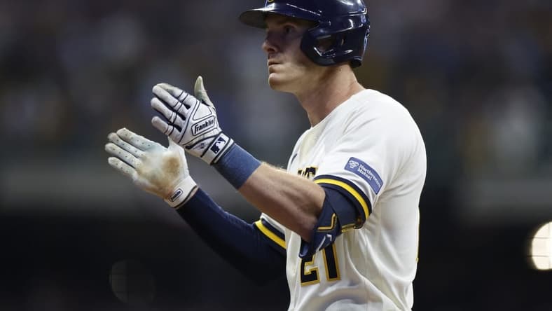 Oct 4, 2023; Milwaukee, Wisconsin, USA; Milwaukee Brewers player Mark Canha (21) reacts after hitting a single in the eighth inning against the Arizona Diamondbacks during game two of the Wildcard series for the 2023 MLB playoffs at American Family Field. Mandatory Credit: Kamil Krzaczynski-USA TODAY Sports