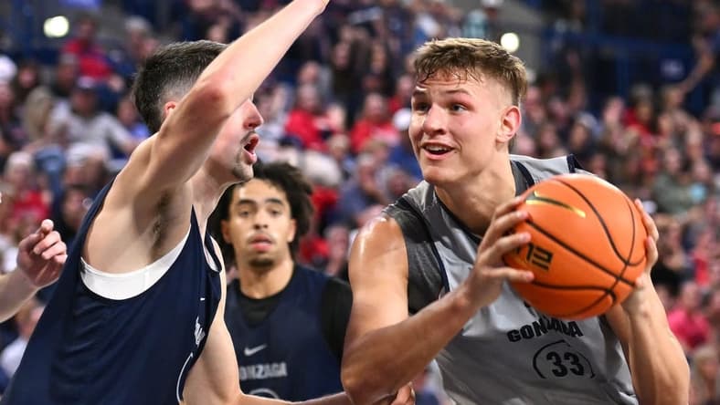 Oct 7, 2023; Seattle, WA, USA; Gonzaga Bulldogs forward Ben Gregg (33) shoots the ball against Gonzaga Bulldogs guard Steele Venters (2) during Kraziness at the Kennel at the McCarthey Athletic Center. Mandatory Credit: James Snook-USA TODAY Sports