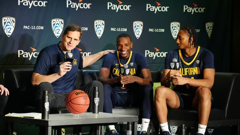 Oct 11, 2023; Las Vegas, NV, USA; California Golden Bears coach Mark Madsen (left), guard Keonte Kennedy (3) and forward Grant Newell (14) during Pac-12 Media Day at Park MGM Las Vegas Conference Center. Mandatory Credit: Kirby Lee-USA TODAY Sports