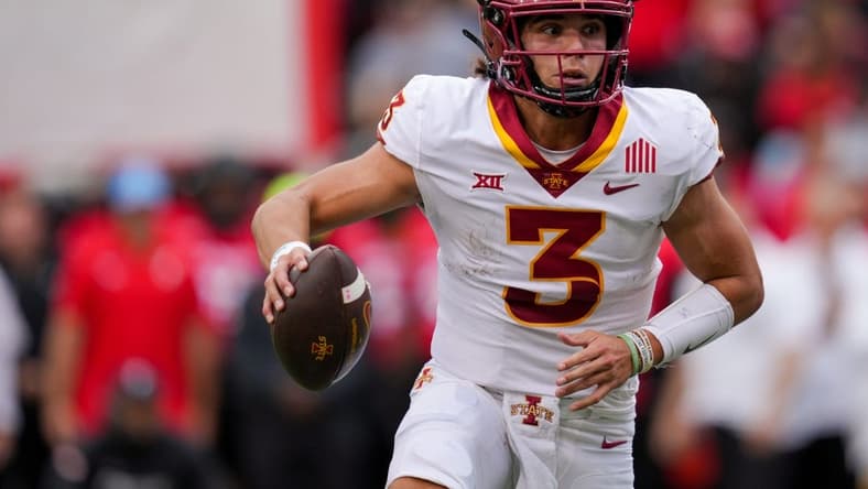 Oct 14, 2023; Cincinnati, Ohio, USA;  Iowa State Cyclones quarterback Rocco Becht (3) carries the ball for a touchdown against the Cincinnati Bearcats in the first half at Nippert Stadium. Mandatory Credit: Aaron Doster-USA TODAY Sports