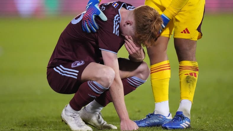Oct 15, 2023; Denver, CO, USA; Colorado Rapids goalkeeper Abe Rodriguez (26) consoles midfielder Oliver Larraz (18) following the loss to the Austin FC II following a shoot out in the Western Conference Final at Dick's Sporting Goods Park. Mandatory Credit: Ron Chenoy-USA TODAY Sports