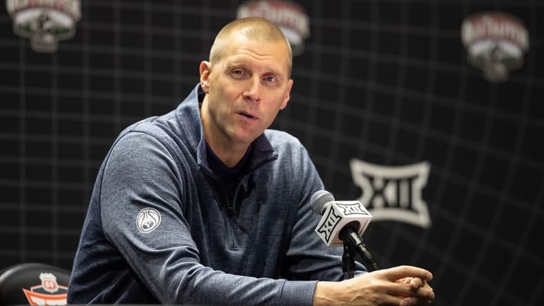 Oct 18, Kansas City, MO, USA; Brigham Young University head coach Mark Pope answers questions at the Big 12 Men s Basketball Tipoff at T-Mobile Center. Mandatory Credit: Kylie Graham-USA TODAY Sports