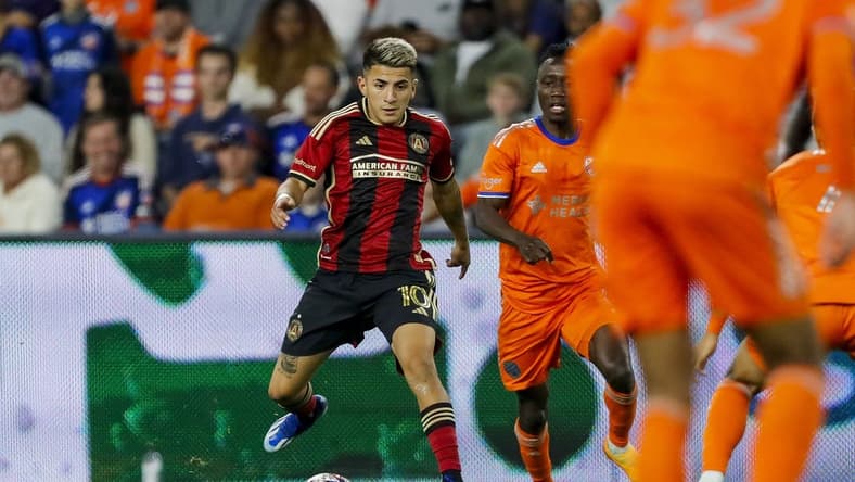 Oct 21, 2023; Cincinnati, Ohio, USA; Atlanta United FC midfielder Thiago Almada (10) dribbles against FC Cincinnati in the second half at TQL Stadium. Mandatory Credit: Katie Stratman-USA TODAY Sports