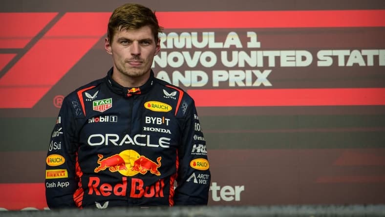 Oct 22, 2023; Austin, Texas, USA; Red Bull Racing Honda driver Max Verstappen (1) of Team Netherlands on podium after the 2023 United States Grand Prix at Circuit of the Americas. Mandatory Credit: Jerome Miron-USA TODAY Sports