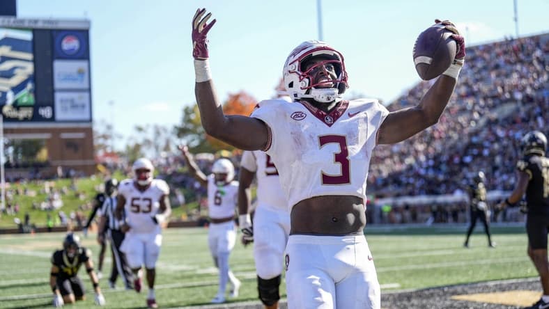 Oct 28, 2023; Winston-Salem, North Carolina, USA; Florida State Seminoles running back Trey Benson (3) celebrates after scoring against the Wake Forest Demon Deacons during the second half at Allegacy Federal Credit Union Stadium. Mandatory Credit: Jim Dedmon-USA TODAY Sports