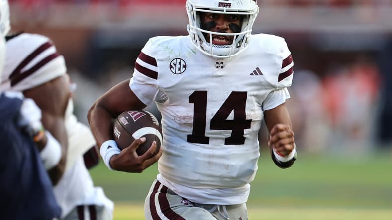 Oct 28, 2023; Auburn, Alabama, USA;  Mississippi State Bulldogs quarterback Mike Wright (14) carries against the Auburn Tigers during the third quarter at Jordan-Hare Stadium. Mandatory Credit: John Reed-USA TODAY Sports