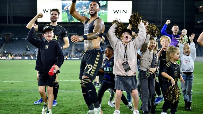 Oct 28, 2023; Los Angeles, CA, USA; Los Angeles FC forward Denis Bouanga (99) celebrates on the field after the match against the Vancouver Whitecaps FC in game one in a round one match of the 2023 MLS Cup Playoffs at BMO Stadium. Mandatory Credit: Jon Durr-USA TODAY Sports