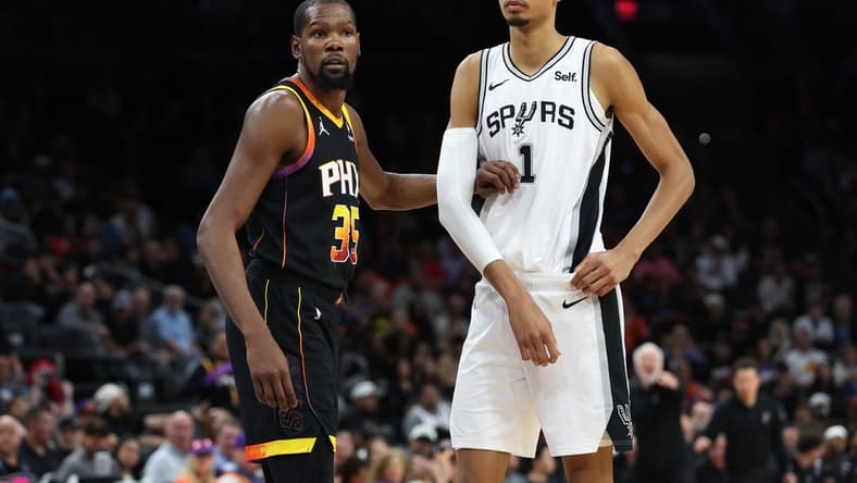 Oct 31, 2023; Phoenix, Arizona, USA; Phoenix Suns forward Kevin Durant #35 guards San Antonio Spurs center Victor Wembanyama #1 during the second half at Footprint Center. Mandatory Credit: Zachary BonDurant-USA TODAY Sports