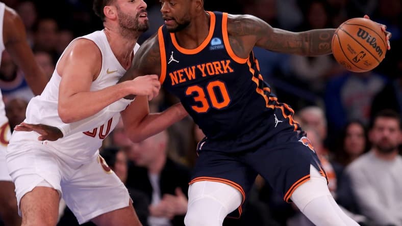 Nov 1, 2023; New York, New York, USA; New York Knicks forward Julius Randle (30) controls the ball against Cleveland Cavaliers forward Georges Niang (20) during the first quarter at Madison Square Garden. Mandatory Credit: Brad Penner-USA TODAY Sports