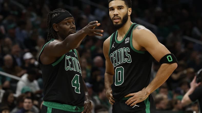 Nov 1, 2023; Boston, Massachusetts, USA; Boston Celtics guard Jrue Holiday (4) talks with forward Jayson Tatum (0) during the second half against the Indiana Pacers at TD Garden. Mandatory Credit: Winslow Townson-USA TODAY Sports