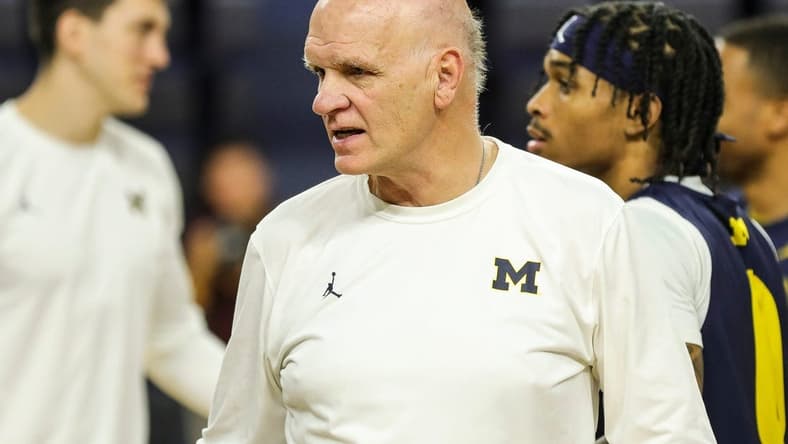 Michigan associate head coach Phil Martelli watches practice during media day at Crisler Center in Ann Arbor on Tuesday, Oct. 17, 2023.