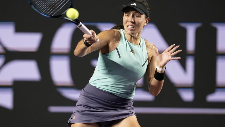 Nov 2, 2023; Cancun, Mexico; Jessica Pegula (USA) returns a shot during her match against Maria Sakkari (GRE) on day five of the GNP Saguaros WTA Finals Cancun. Mandatory Credit: Susan Mullane-USA TODAY Sports