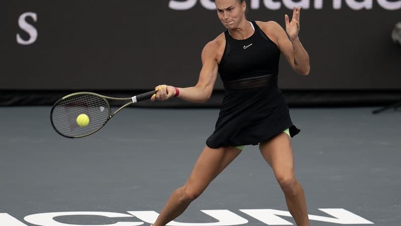 Nov 3, 2023; Cancun, Mexico; Aryna Sabalenka returns a shot during her match against Elena Rybakina (KAZ) on day six of the GNP Saguaros WTA Finals Cancun. Mandatory Credit: Susan Mullane-USA TODAY Sports