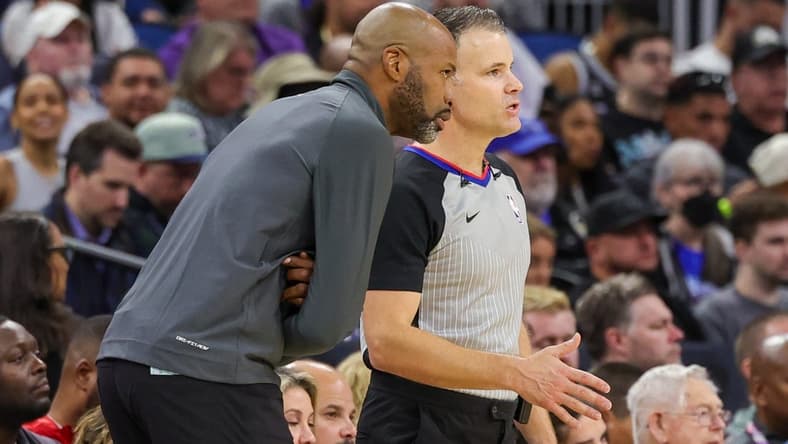 Nov 4, 2023; Orlando, Florida, USA; Orlando Magic head coach Jamahl Mosley talks to referee Mark Lindsay (29) during the second quarter against the Los Angeles Lakers at Amway Center. Mandatory Credit: Mike Watters-USA TODAY Sports