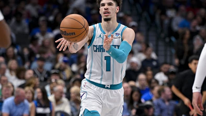 Nov 5, 2023; Dallas, Texas, USA; Charlotte Hornets guard LaMelo Ball (1) passes the ball against the Dallas Mavericks during the second half at the American Airlines Center. Mandatory Credit: Jerome Miron-USA TODAY Sports
