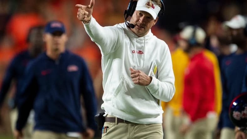 Mississippi Rebels coach Lane Kiffin celebrates a pass interference call as Auburn Tigers take on Mississippi Rebels at Jordan-Hare Stadium in Auburn, Ala., on Saturday, Oct. 21, 2023. Mississippi Rebels defeated Auburn Tigers 28-21.
