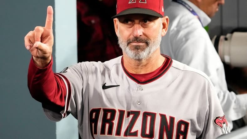 Arizona Diamondbacks manager Torey Lovullo (17) gestures after defeating the Los Angeles Dodgers 4-2 during Game 2 of the NLDS at Dodger Stadium in Los Angeles on Oct. 9, 2023.