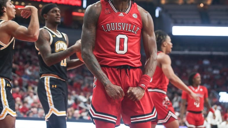 Louisville Cardinals guard Mike James (0) yells after drawing the foul against UMBC Monday night at the Cardinals men's basketball season opener. Nov.6, 2023.