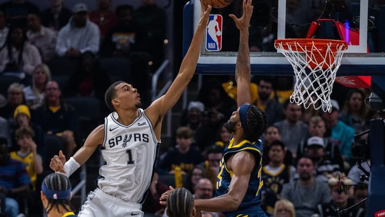 Nov 6, 2023; Indianapolis, Indiana, USA; San Antonio Spurs center Victor Wembanyama (1) shoots the ball while Indiana Pacers forward Isaiah Jackson (22) defends in the first half at Gainbridge Fieldhouse. Mandatory Credit: Trevor Ruszkowski-USA TODAY Sports