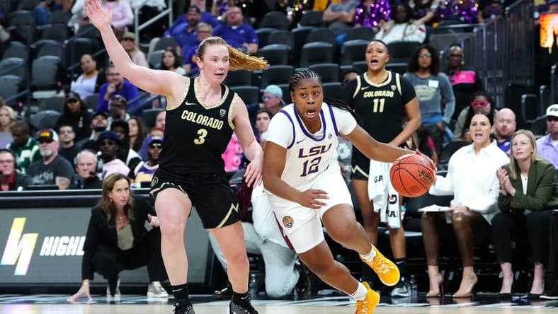 Nov 6, 2023; Las Vegas, Nevada, USA; LSU Lady Tigers guard Mikaylah Williams (12) dribbles against Colorado Buffaloes guard Frida Formann (3) during the second quarter at T-Mobile Arena. Mandatory Credit: Stephen R. Sylvanie-USA TODAY Sports