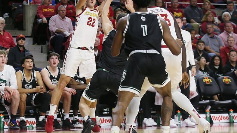 Iowa State Cyclones forward Milan Momcilovic (22) takes a three-point shot over Green Bay Defenders during the first half at Hilton Coliseum on Monday, Nov. 6, 2023, in Ames, Iowa.