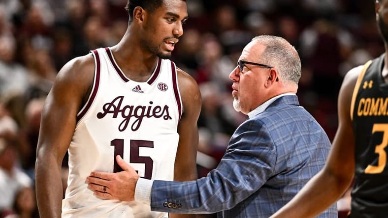 Nov 6, 2023; College Station, Texas, USA; Texas A&M Aggies head coach Buzz Williams speaks with Henry Coleman III during a time out in the second half against the Texas A&M Commerce at Reed Arena. Mandatory Credit: Maria Lysaker-USA TODAY Sports