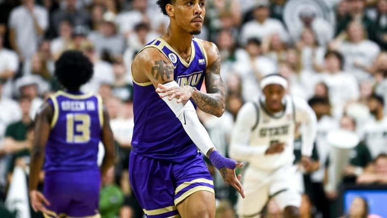 James Madison's Terrence Edwards, Jr. celebrates after a 3-pointer against Michigan State during the first half on Monday, Nov. 6, 2023, in East Lansing.