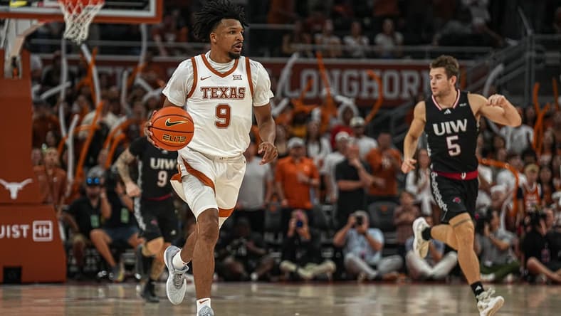 Texas Longhorns guard Ithiel Horton (9) dribbles the ball towards the University of the Incarnate Word basket during the men   s basketball game at the Moody Center on Monday, Nov. 6, 2023 in Austin.