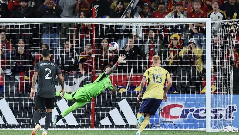 Nov 6, 2023; Sandy, Utah, USA; Houston Dynamo goalkeeper Steve Clark (12) allows a goal scored by Real Salt Lake forward Jefferson Savarino (10) during the second half at America First Field. Mandatory Credit: Rob Gray-USA TODAY Sports