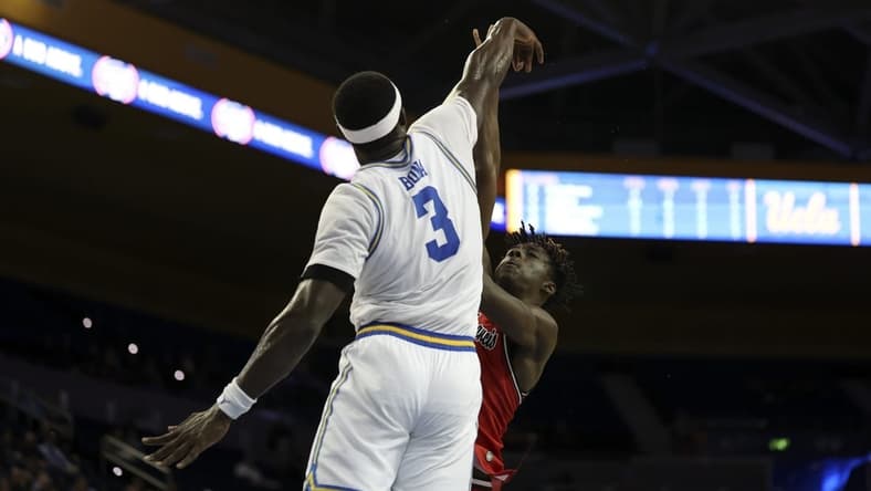 Nov 6, 2023; Los Angeles, California, USA;  UCLA Bruins forward Adem Bona (3) blocks a shot by St. Francis (Pa) Red Flash forward Miles Webb (3) during the second half at Pauley Pavilion presented by Wescom. Mandatory Credit: Kiyoshi Mio-USA TODAY Sports