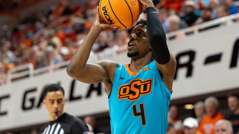 Oklahoma State guard Jarius Hicklen (4) shoots the ball during the first half of an NCAA men  s college basketball game against Abilene Christian Monday, Nov. 6, 2023., in Stillwater, Okla. (Mitch Alcala for the Oklahoman)