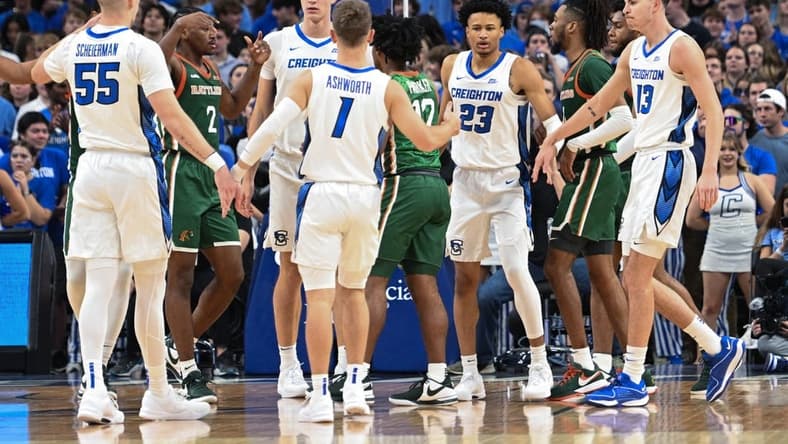 Nov 7, 2023; Omaha, Nebraska, USA;  Creighton Bluejays guard Trey Alexander (23) celebrates with teammates after scoring against the Florida A&M Rattlers in the first half at CHI Health Center Omaha. Mandatory Credit: Steven Branscombe-USA TODAY Sports