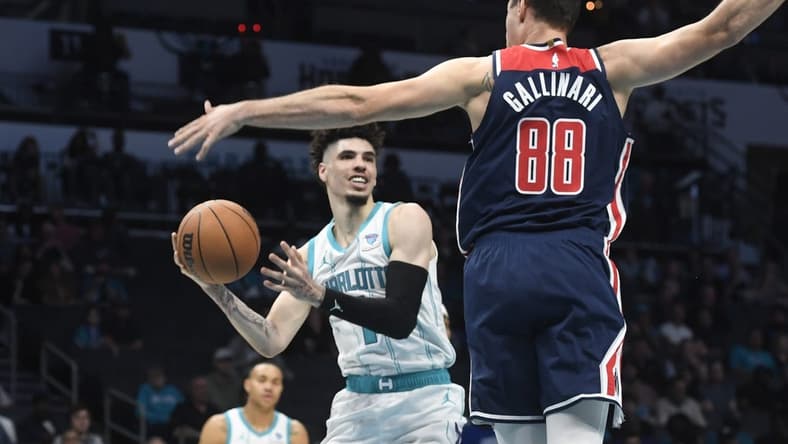 Nov 8, 2023; Charlotte, North Carolina, USA; Charlotte Hornets guard LaMelo Ball (1) looks to pass as he is defended by Washington Wizards Danilo Gallinari (88) during the first half at the Spectrum Center. Mandatory Credit: Sam Sharpe-USA TODAY Sports