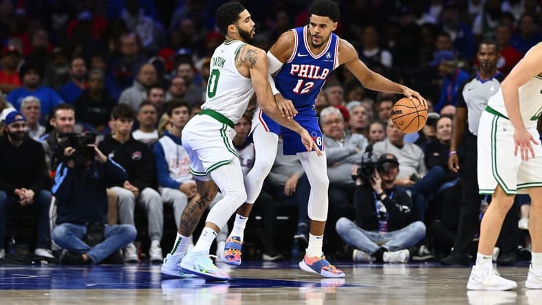 Nov 8, 2023; Philadelphia, Pennsylvania, USA; Boston Celtics forward Jayson Tatum (0) defends Philadelphia 76ers forward Tobias Harris (12) in the second quarter at Wells Fargo Center. Mandatory Credit: Kyle Ross-USA TODAY Sports