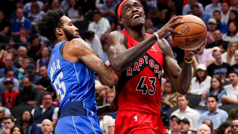 Nov 8, 2023; Dallas, Texas, USA; Toronto Raptors forward Pascal Siakam (43) looks to shoot as Dallas Mavericks forward Derrick Jones Jr. (55) defends during the second half at American Airlines Center. Mandatory Credit: Kevin Jairaj-USA TODAY Sports