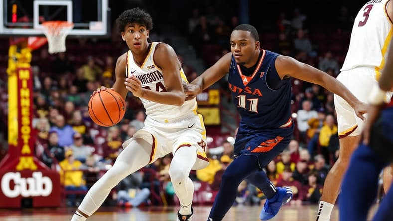 Nov 10, 2023; Minneapolis, Minnesota, USA; Minnesota Golden Gophers guard Cam Christie (24) works around Texas-San Antonio Roadrunners guard Isaiah Wyatt (11) during the first half at Williams Arena. Mandatory Credit: Matt Krohn-USA TODAY Sports