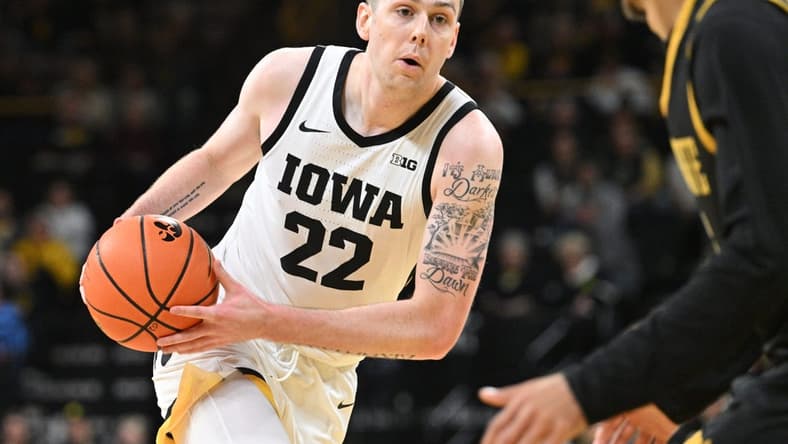 Nov 10, 2023; Iowa City, Iowa, USA; Iowa Hawkeyes forward Patrick McCaffery (22) goes to the basket against the Alabama State Hornets during the first half at Carver-Hawkeye Arena. Mandatory Credit: Jeffrey Becker-USA TODAY Sports