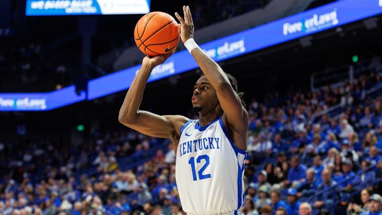 Nov 10, 2023; Lexington, Kentucky, USA; Kentucky Wildcats guard Antonio Reeves (12) shoots the ball during the second half against the Texas A&M Commerce Lions at Rupp Arena at Central Bank Center. Mandatory Credit: Jordan Prather-USA TODAY Sports