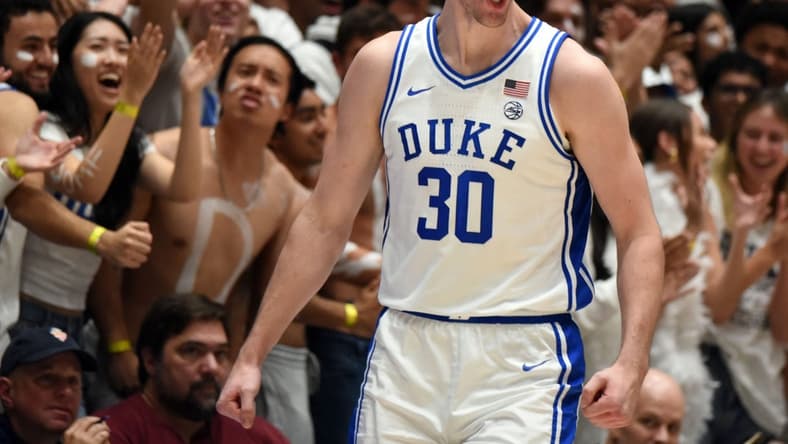 Nov 10, 2023; Durham, North Carolina, USA;  Duke Blue Devils center Kyle Filipowski(30) reacts to scoring during the second half against the Arizona Wildcats at Cameron Indoor Stadium. Mandatory Credit: Rob Kinnan-USA TODAY Sports