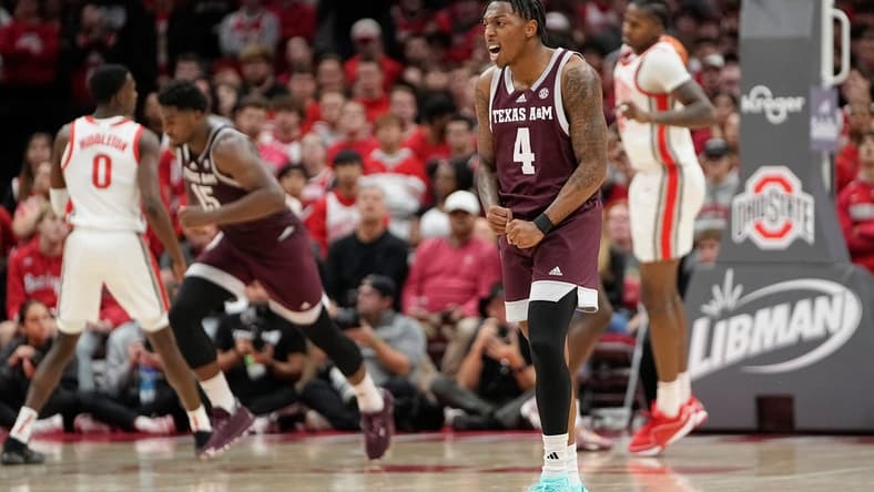 Nov 10, 2023; Columbus, Ohio, USA; Texas A&M Aggies guard Wade Taylor IV (4) celebrates a basket during the second half of the NCAA basketball game against the Ohio State Buckeyes at Value City Arena. Ohio State lost 73-66.