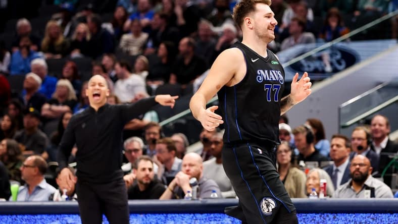 Nov 10, 2023; Dallas, Texas, USA; Dallas Mavericks guard Luka Doncic (77) reacts in front of LA Clippers head coach Tyronn Lue during the second half at American Airlines Center. Mandatory Credit: Kevin Jairaj-USA TODAY Sports