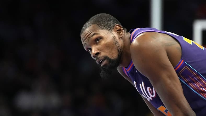 Nov 10, 2023; Phoenix, Arizona, USA; Phoenix Suns forward Kevin Durant (35) watches a replay against the Los Angeles Lakers in the first half at Footprint Center. Mandatory Credit: Rick Scuteri-USA TODAY Sports